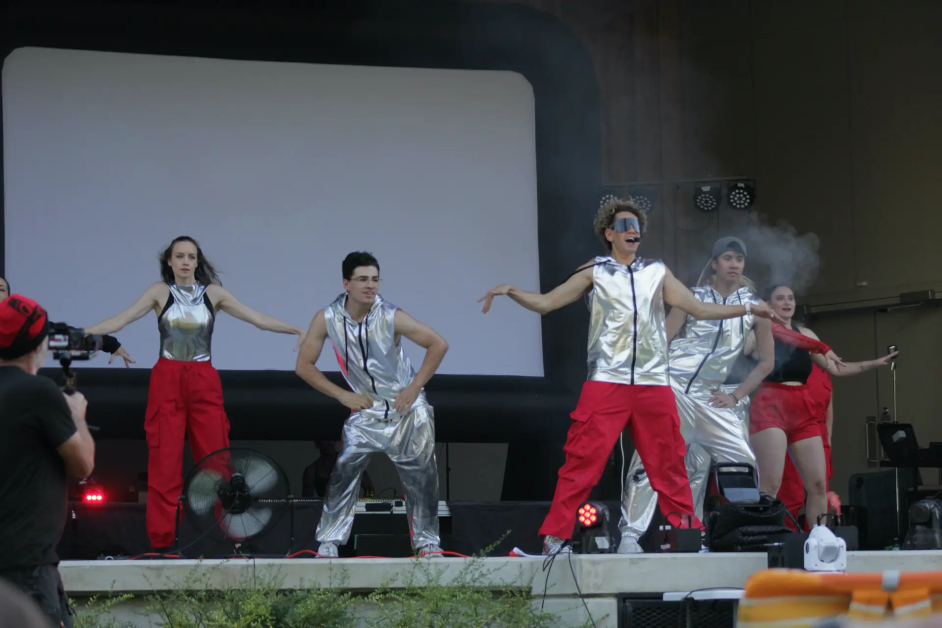 Kids and teens dancing on stage with Dallas Grey Dance Academy